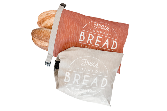 Two bread bags with 'Fresh Baked Bread' text on a white background